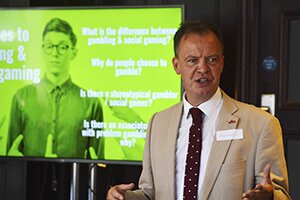 YGAM presenting gambling-related harm-prevention workshops